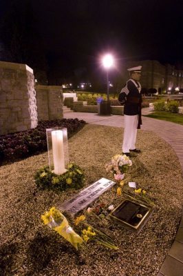 Members of the Virginia Tech Corps of Cadets guard the memorial candle. 